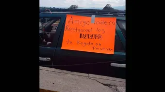 Pobladores de Tlahuapan se solidarizan con transportistas varados en la México-Puebla y ofrecen comida