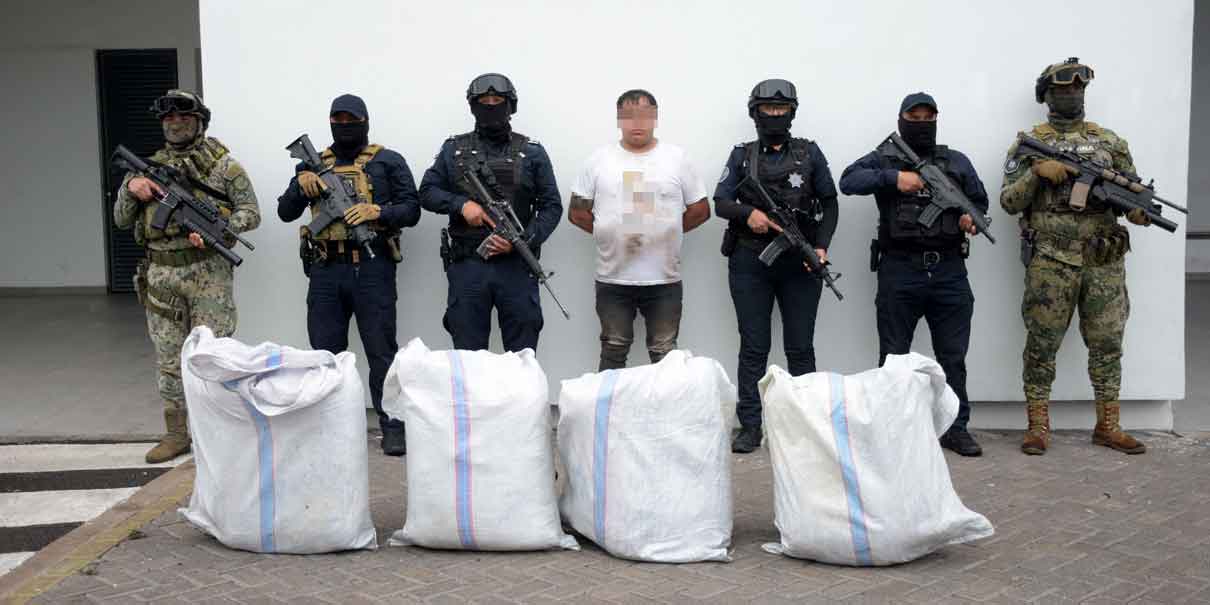 Detienen a hombre con cuatro costales llenos de marihuana en Totimehuacán