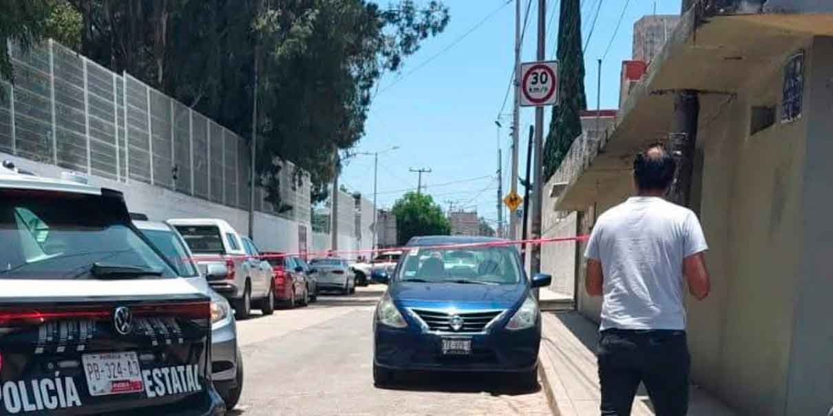 Cadáver de mujer afuera de escuela