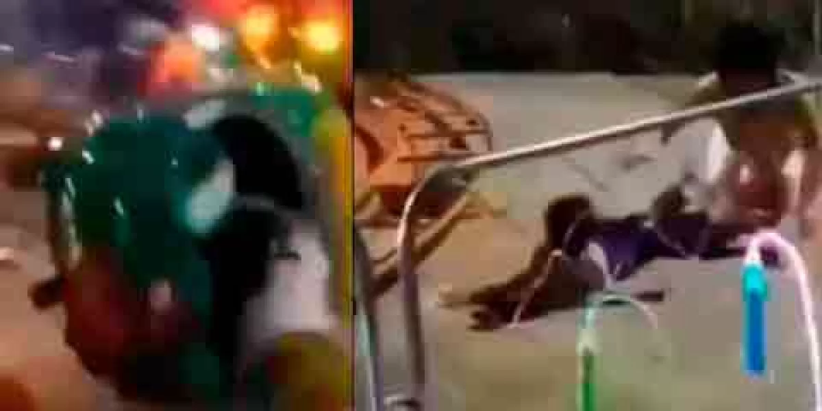 VIDEO. Mujer y un menor de edad salen disparados de un juego mecánico