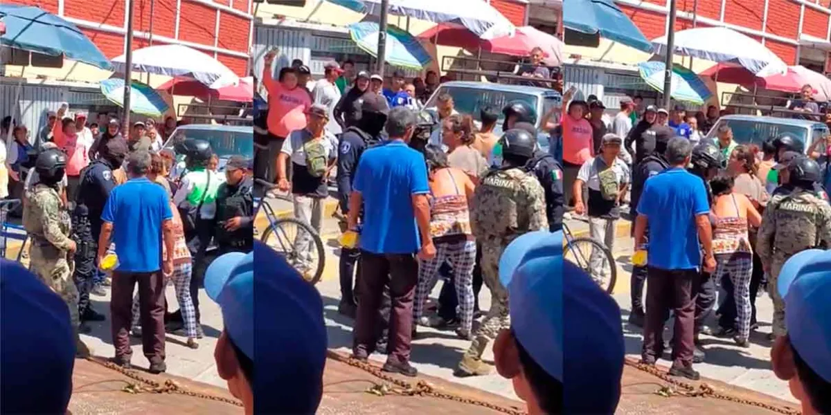 Riña entre comerciantes y agentes de Tránsito por operativo en mercado de Izúcar de Matamoros