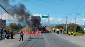 Tras atropellados, pobladores de Villa Alta exigen topes sobre la federal Tlaxcala-Texmelucan