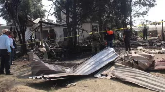 Por fatales lesiones por explosión de polvorín en Coronango murieron padre e hijos