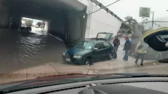En Texmelucan, intensa lluvia causó encharcamientos y numerosos daños en autos