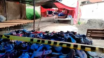 Comerciantes de Xicotepec hallan cadáver putrefacto colgado en vivienda