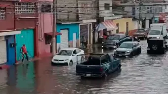 Tromba causó inundaciones y daños en calles de Atlixco 