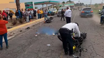 Tragedia en carretera de Huejotzingo: Dos motociclistas fallecen tras impacto frontal