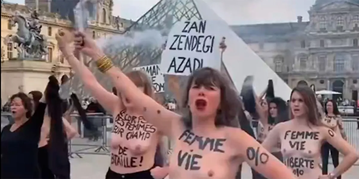 En contra de la violencia machista ante el Louvre activistas protestan 