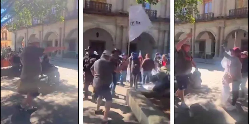 VIDEO. Turista extranjero confronta a manifestantes de la Uacol en el Zócalo de Oaxaca